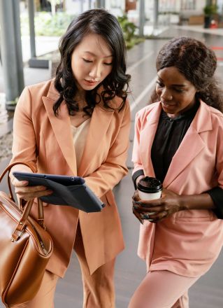 Portrait of a confident businesswoman standing in a modern office environment.